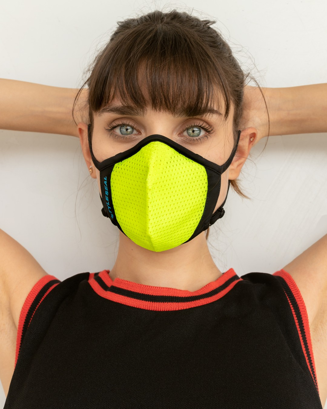 girl wearinf styleseal pro yellow reusable face mask