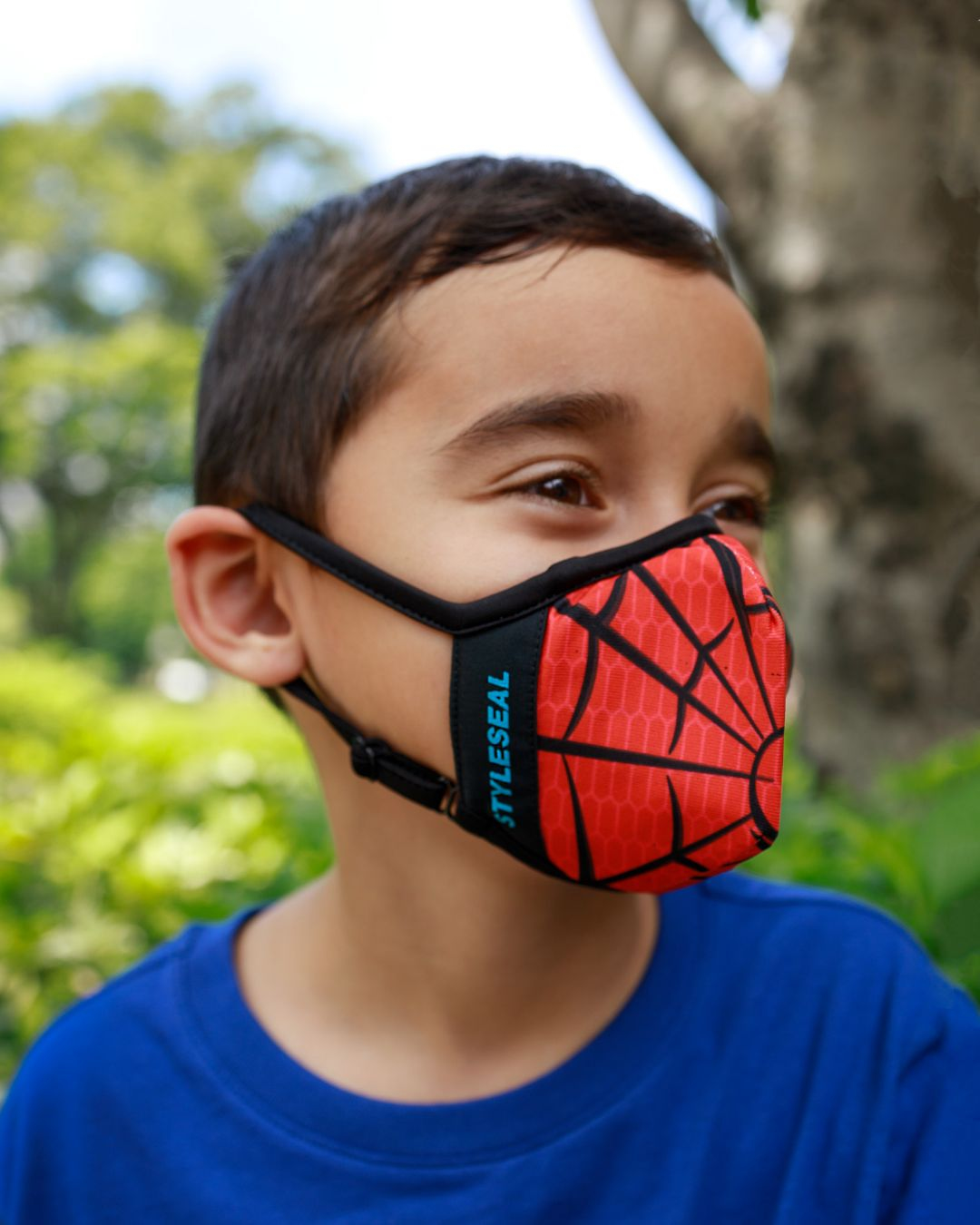 boy wearing styleseal pro spiderboy mask