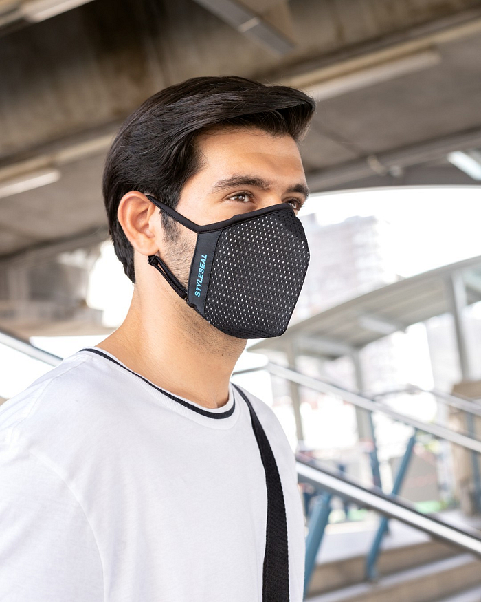 man wearing black mesh styleseal pro reusable face mask