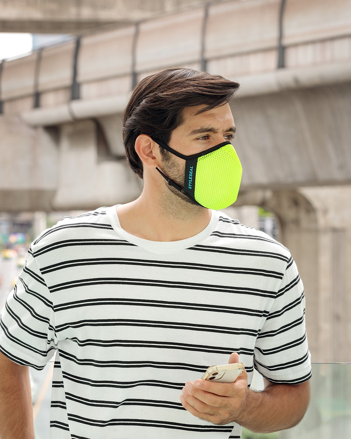 man wearing styleseal pro yellow reusable face mask