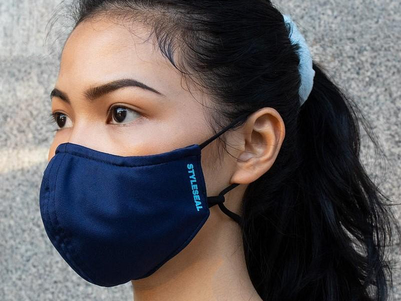 woman wearing styleseal basic face mask navy blue