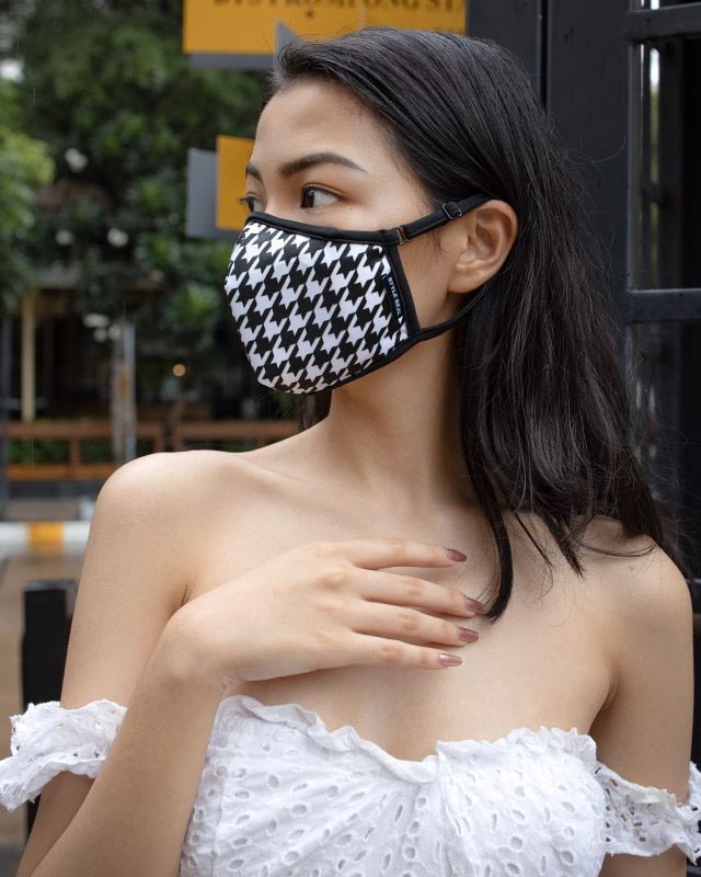 woman wearing styleseal houndstooth air pollution mask