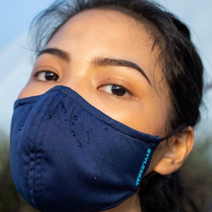 woman wearing styleseal basic face mask navy blue water repellent